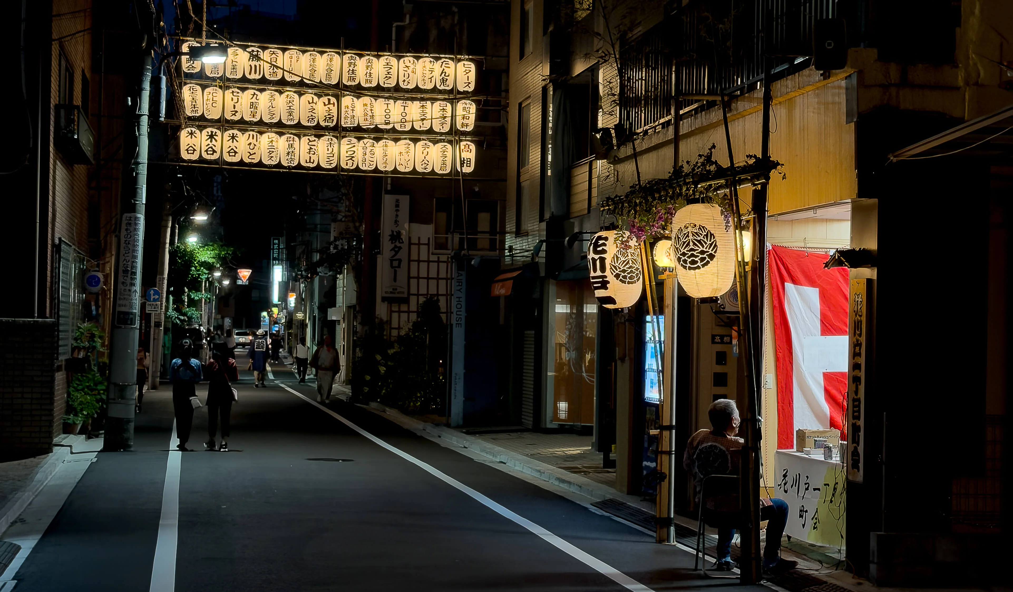 A lantern-lined street in Asakusa during the 2026 Sanja Matsuri Festival.  